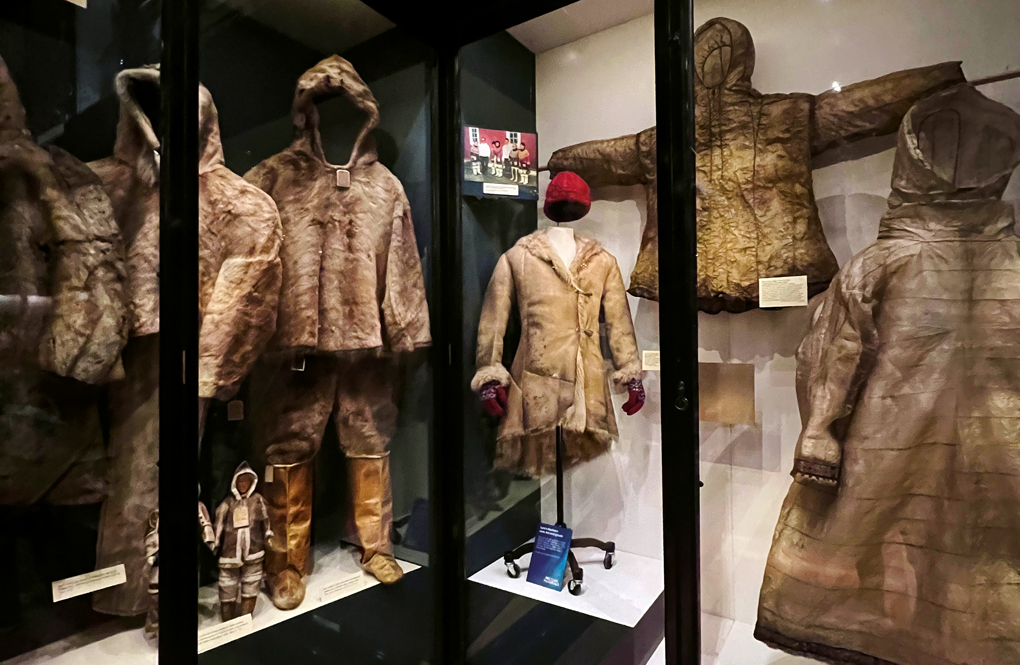 Museum case display of arctic clothing