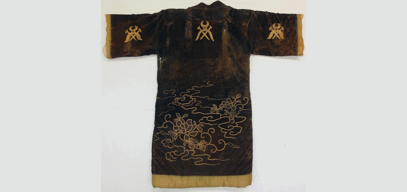 Back of brown kimono with golden stitchwork