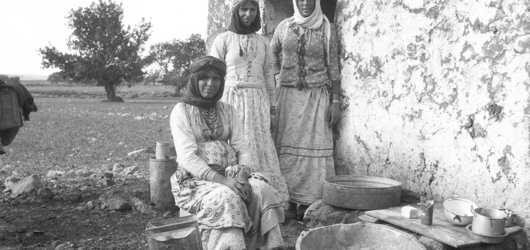 Three Palestinian women working at archaeology excavation