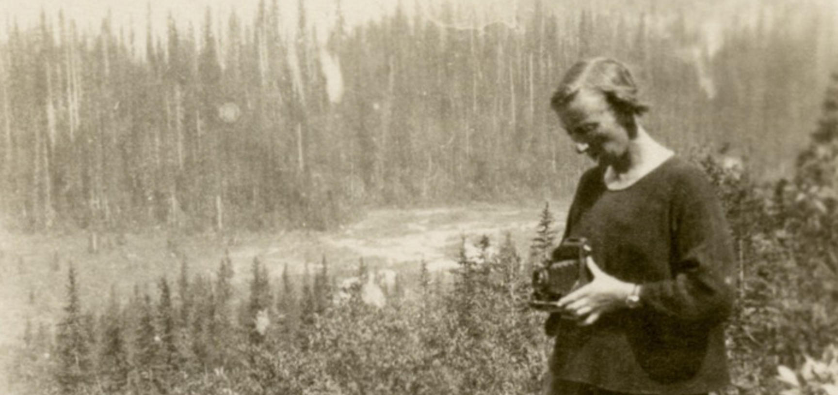 Beatrice Blackwood with her camera during anthropological fieldwork in Yoho Valley.