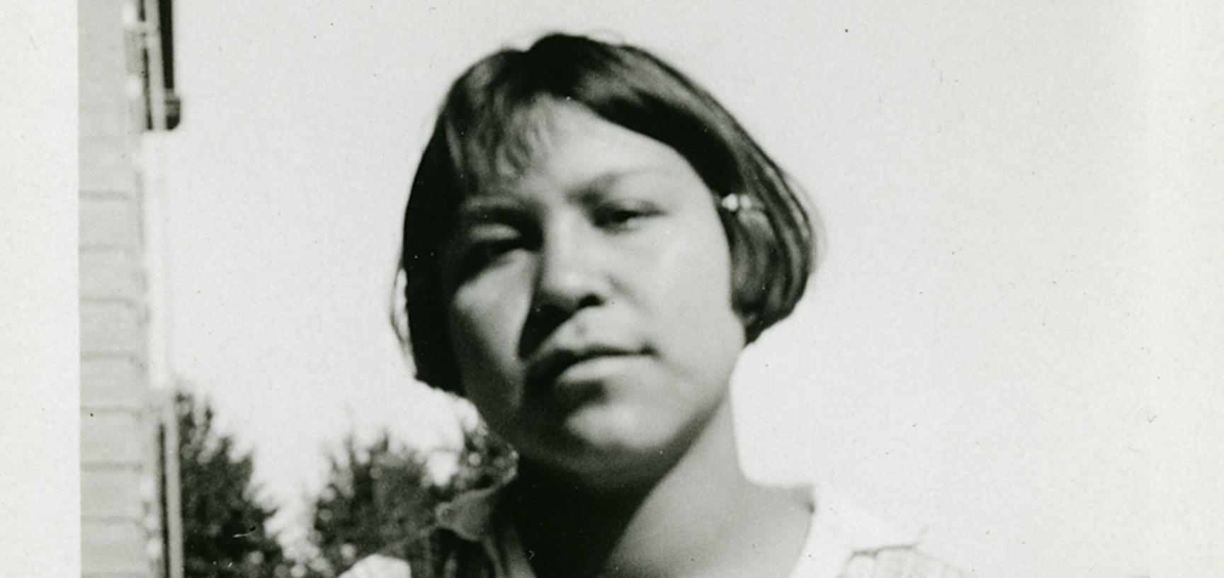 Portrait of Minnie Wilson, a student at the Coqualeetza Indian Residential School.