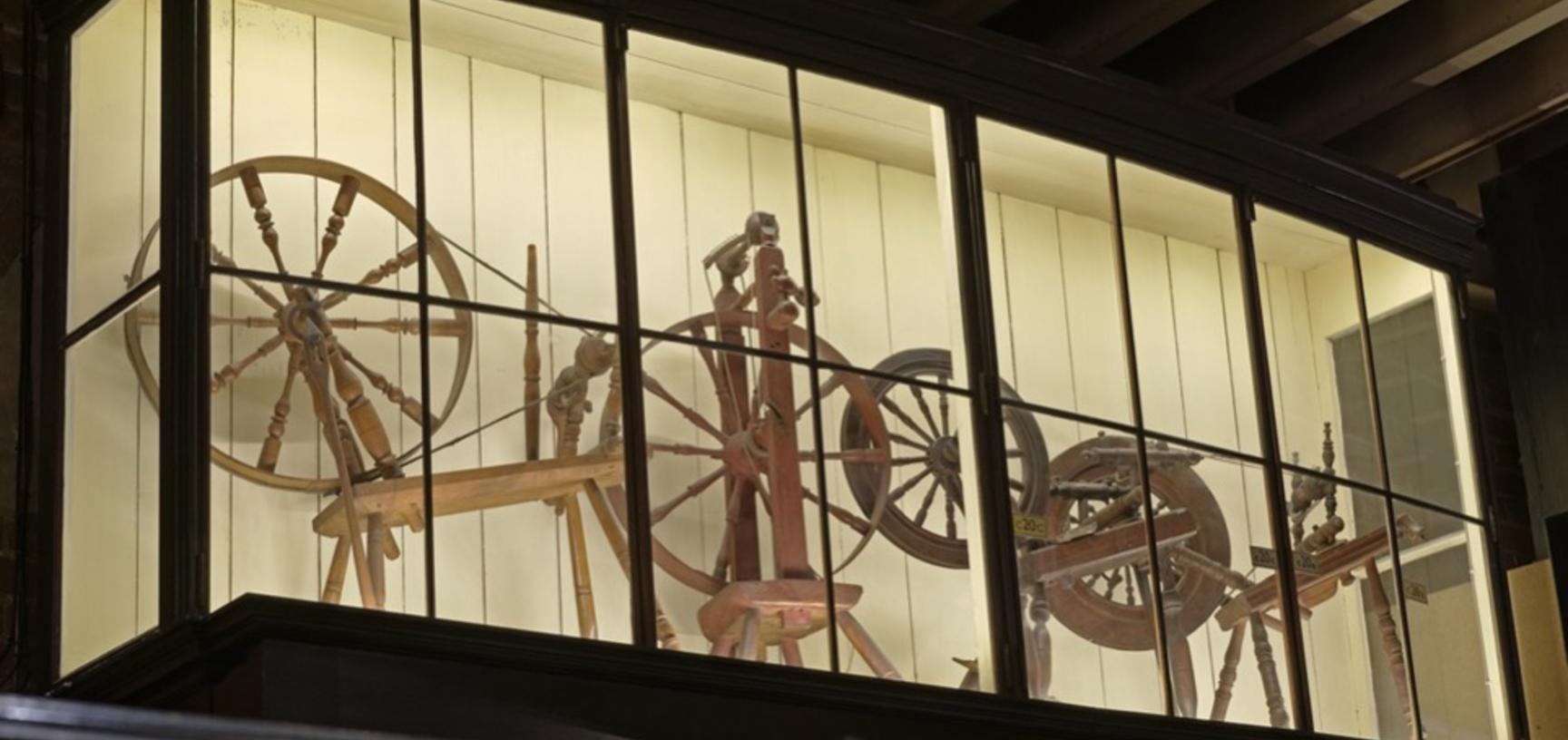 Before and after. Perhaps you never previously noticed this display of spinning wheels high up in the Court (ground floor)? New LED lighting, plus the conservation, re-positioning and titling of case contents, has brought these displays back to life.