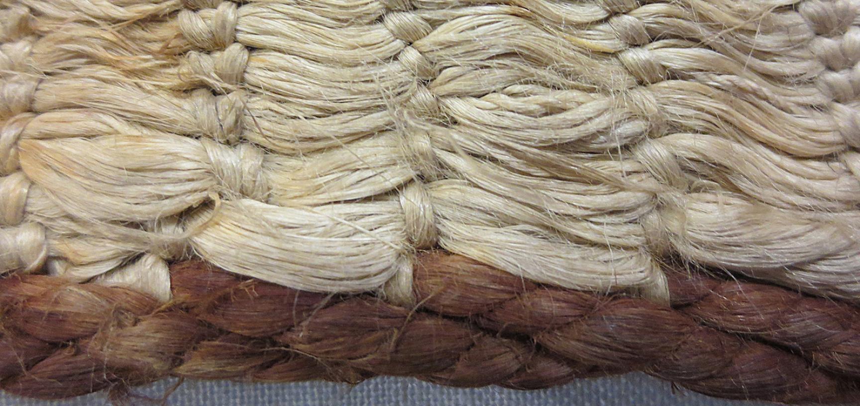 Detail of side border showing muka (flax fibre) in cloak (1886.1.1132)