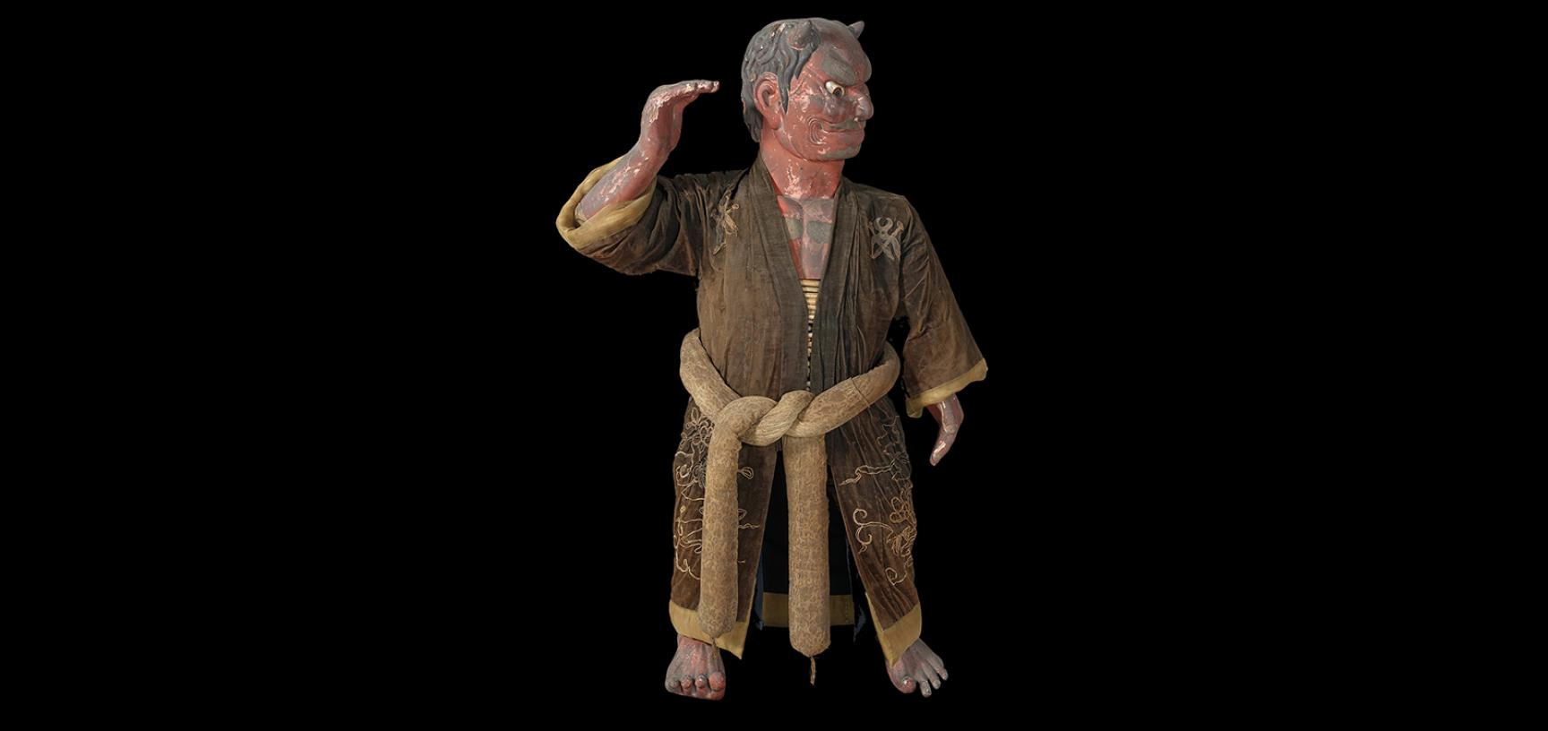 Robed body of carved oni figure