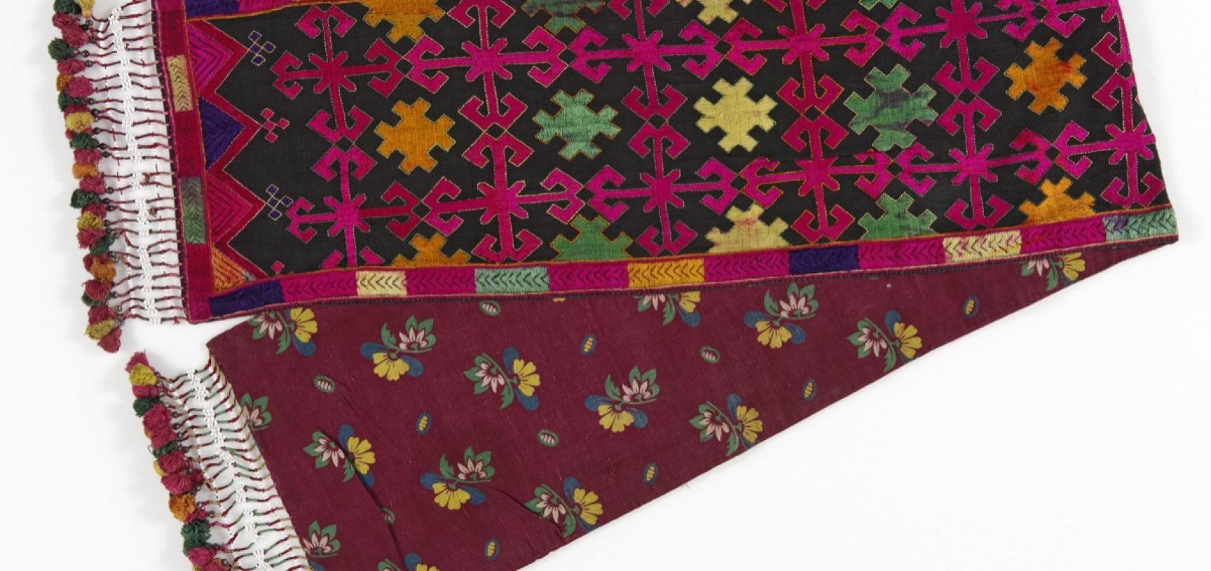 Man’s scarf. Sherakot, Kohistan, Pakistan. This scarf is embroidered in coloured silks in the style typical of Swat Kohistan. (Copyright Pitt Rivers Museum, University of Oxford. Accession Number: 2008.116.7)