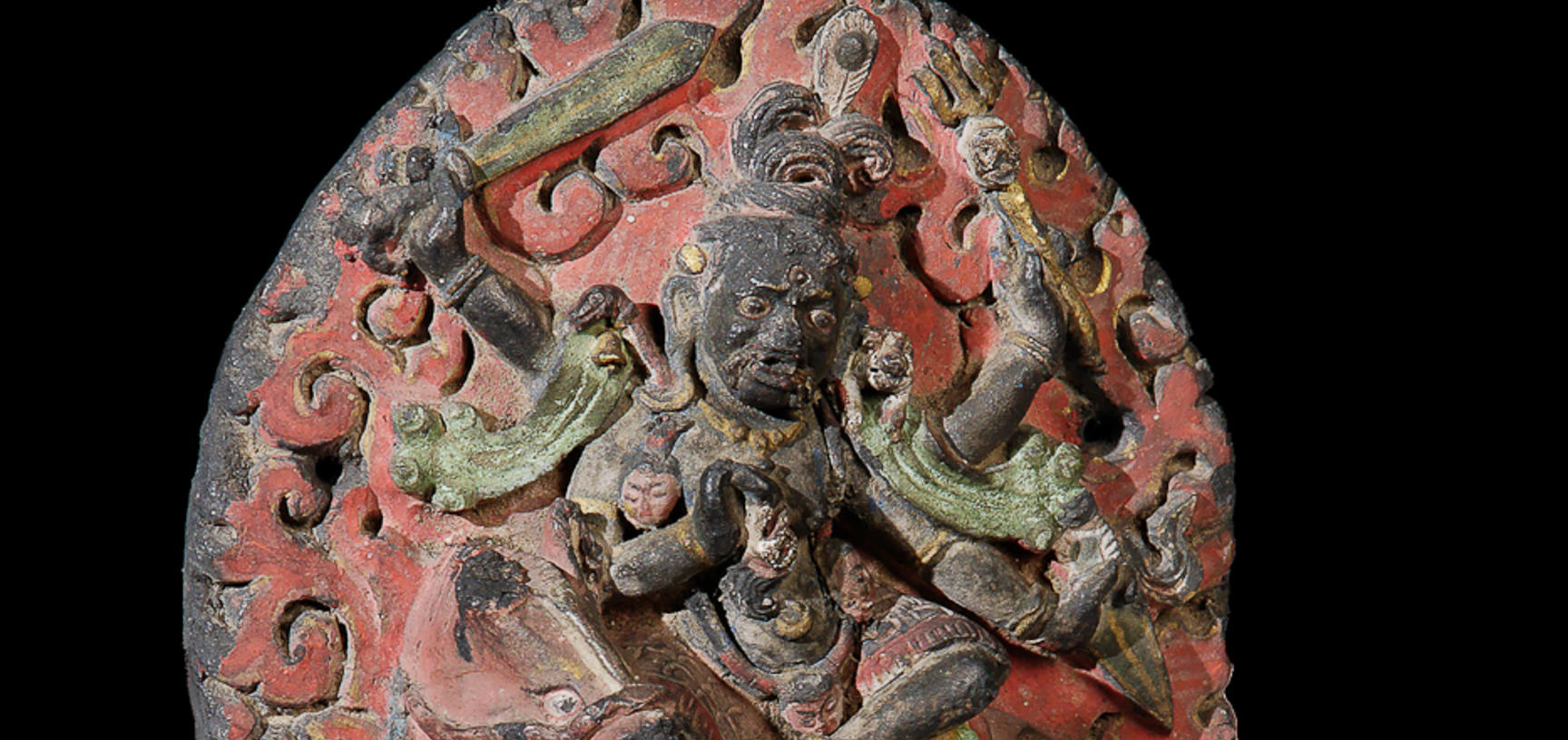 Votive object (Tibetan: tsa-tsa) depicting Palden Lhamo. Acquired by Augustus Pitt-Rivers before 1884 and donated as part of the Pitt Rivers Museum founding collection.