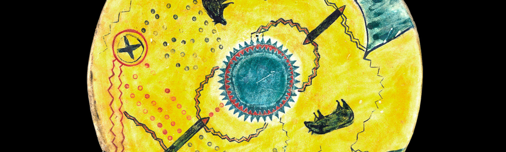 Navajo shield painted yellow with a central design of a green and red circle with triangles around the edge.  There are two bearlike animals painted in blue near the centre.