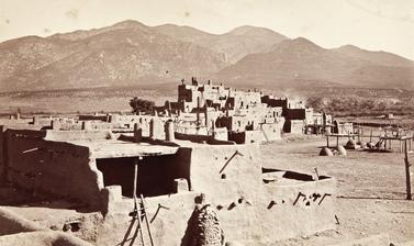 Multi-storeyed houses in Taos Pueblo, a settlement which has been inhabited for over six centuries and is the northernmost of the Rio Grande pueblos. Photograph by John Hillers. Taos, New Mexico, United States of America. 1880.