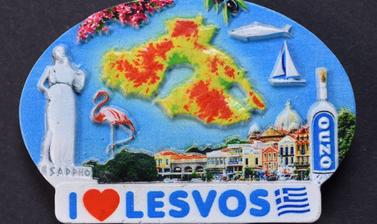 Small oval showing a stylised map of Lesbos and the words ‘I Love Lesvos’.