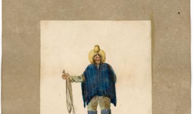 A Chilean gaucho or cowboy, dressed in characteristic hat, poncho, and leggings, and holding a lasso. 