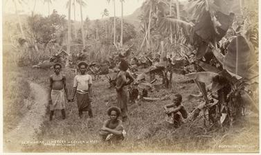 Fijian men near the cemetery at Levuka. Photograph by Alfred Burton for the Burton Brothers studio (Dunedin). Levuka, Ovalau, Fiji. 14 July 1884.