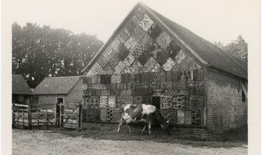 Barn decorated with old printing plates.