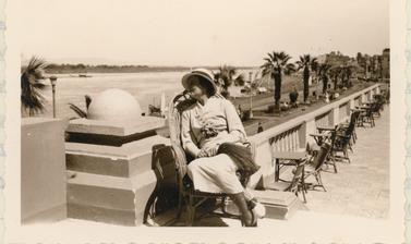 Portrait of Ellen Ettlinger, pictured sitting on a hotel terrace alongside the River Nile. 