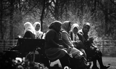 Turkish women chatting on a bench in the park