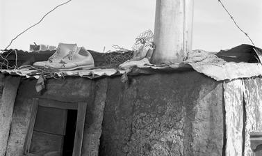 Shoes drying on rooftop. Windermere, Cape Town, South Africa. Photograph by Bryan Heseltine. Circa 1949–1952. (Copyright Bryan Heseltine)