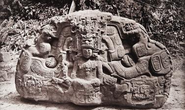 Zoomorph P (also known as Monument 16), north face, dated AD 795. This massive stone carving, now understood to represent the Cosmic Monster of Maya mythology, was known by Alfred Maudslay as the ‘Great Turtle’, and can be seen marked on his map of the Qu