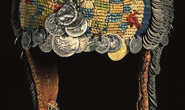 Multi-coloured cotton headdress decorated with round silver and gold coins