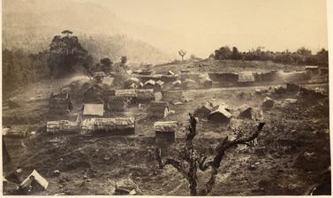 View of an unidentified Naga settlement on a hillside. 