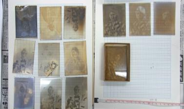 Early twentieth-century glass plates drying in the RD3 Project's workspace. (Copyright RD3 Project/Rikuzentakata City Museum)