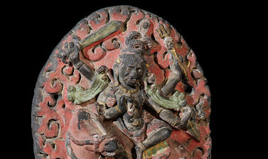 Votive object (Tibetan: tsa-tsa) depicting Palden Lhamo. Acquired by Augustus Pitt-Rivers before 1884 and donated as part of the Pitt Rivers Museum founding collection.