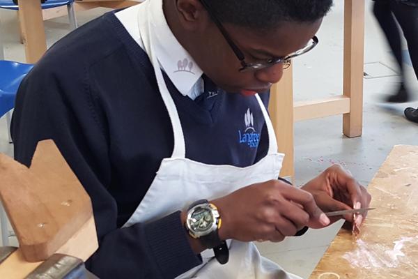 Student working on a teaspoon (Copyright Langtree School)