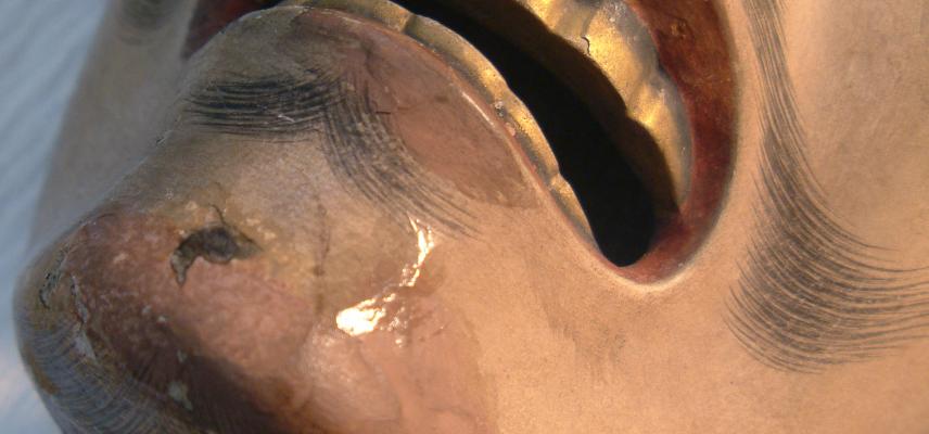 Detail of damage on mask (1884.114.23) - the conservator needs to decide at what stage in an object's life a surface treatment or repair has taken place