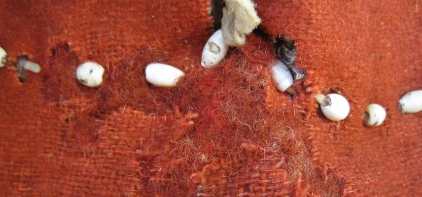 Stroud cloth on war bonnet (1954.8.140) with felted wool gap-fill