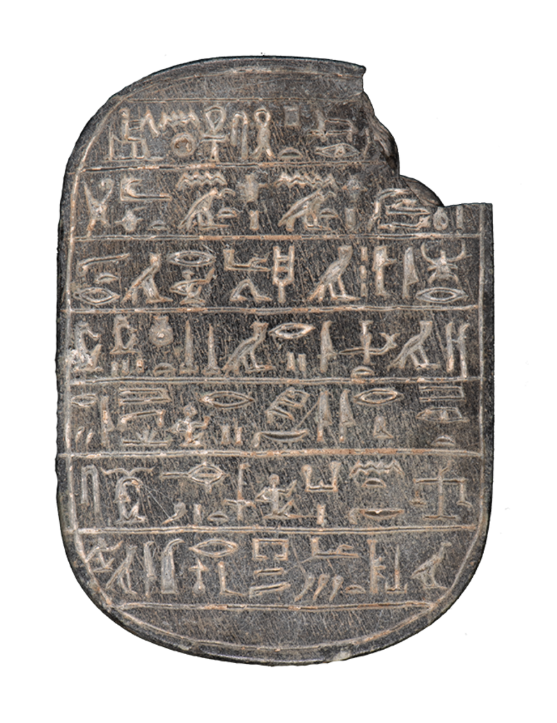 Rounded tablet of stone, inscribed with a pictorial language, with a section missing in the top right.