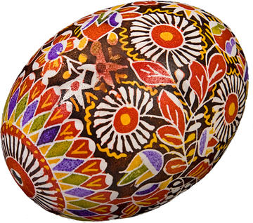 Ornately painted Easter egg decorated with red and white flowers