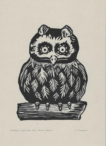 Black and white image of carved owl