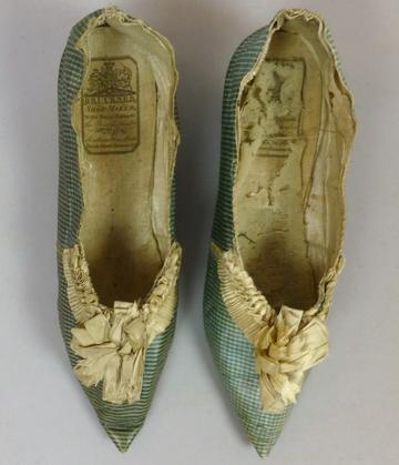 Ladies green silk shoes with cream rosette