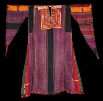 Purple gown with elaborate red and orange embroidery on yoke and pointed sleeves