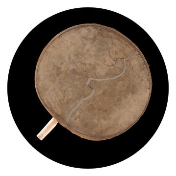 round animal skin drum with ivory handle