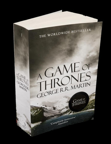 Picture of a copy of worldwide bestseller paperback book A Game of Thrones. 