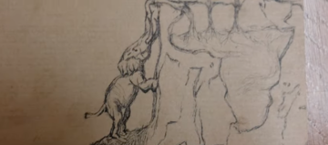 drawing of a small elephant carved into the side of a tusk, standing on its back legs with its trunk raised.