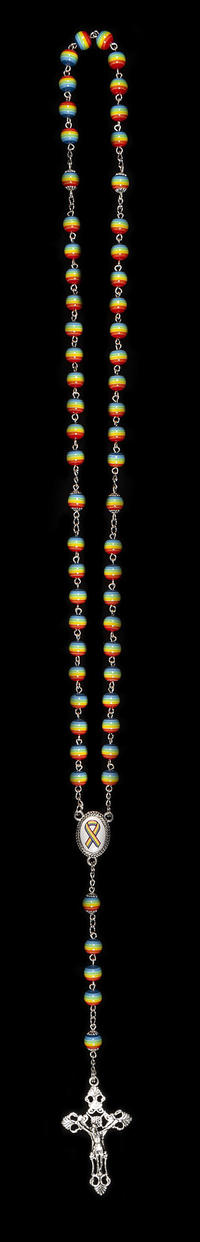 Metal cross and chain with red, orange, yellow, green and blue striped circular beads.